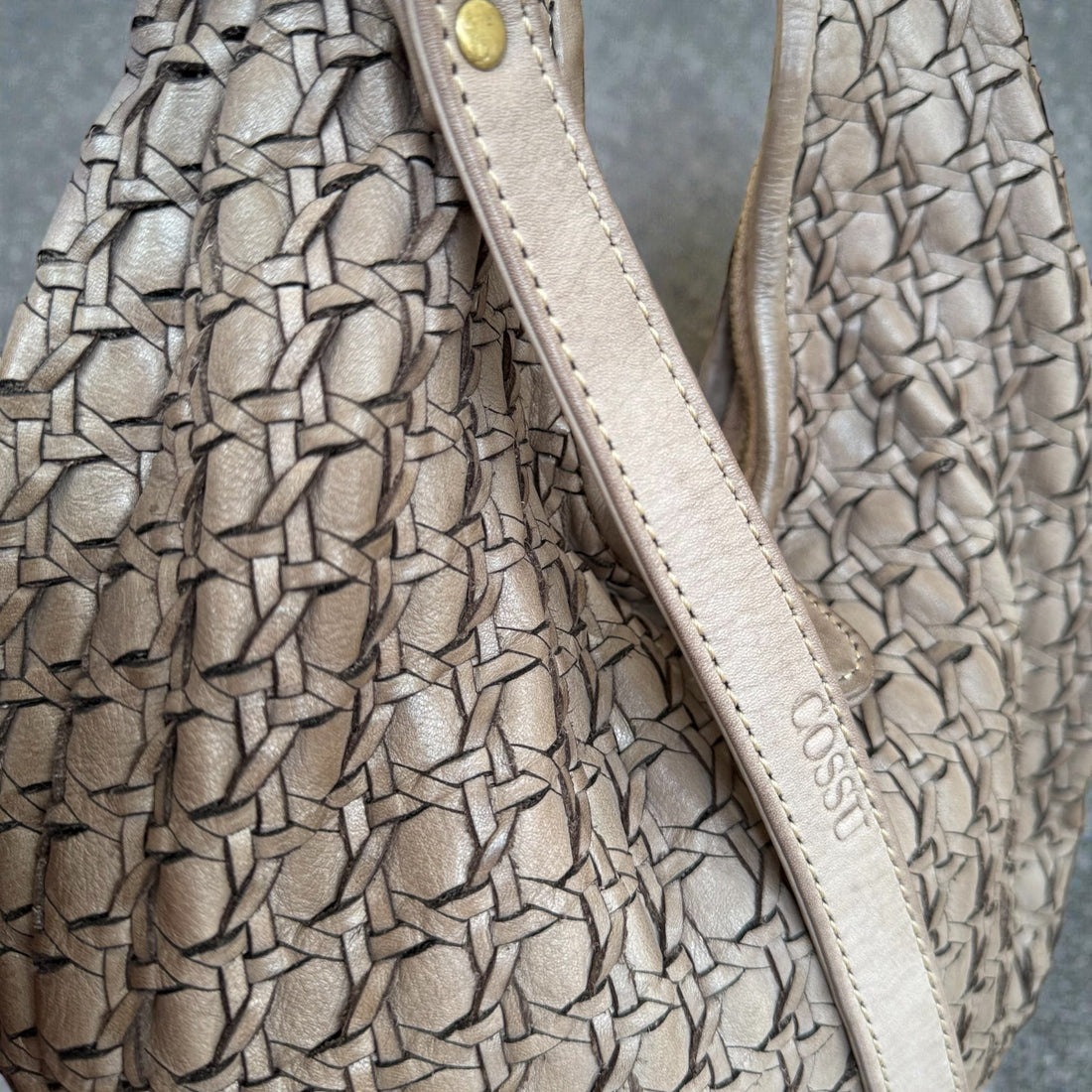 Close up of a handwoven leather bag 