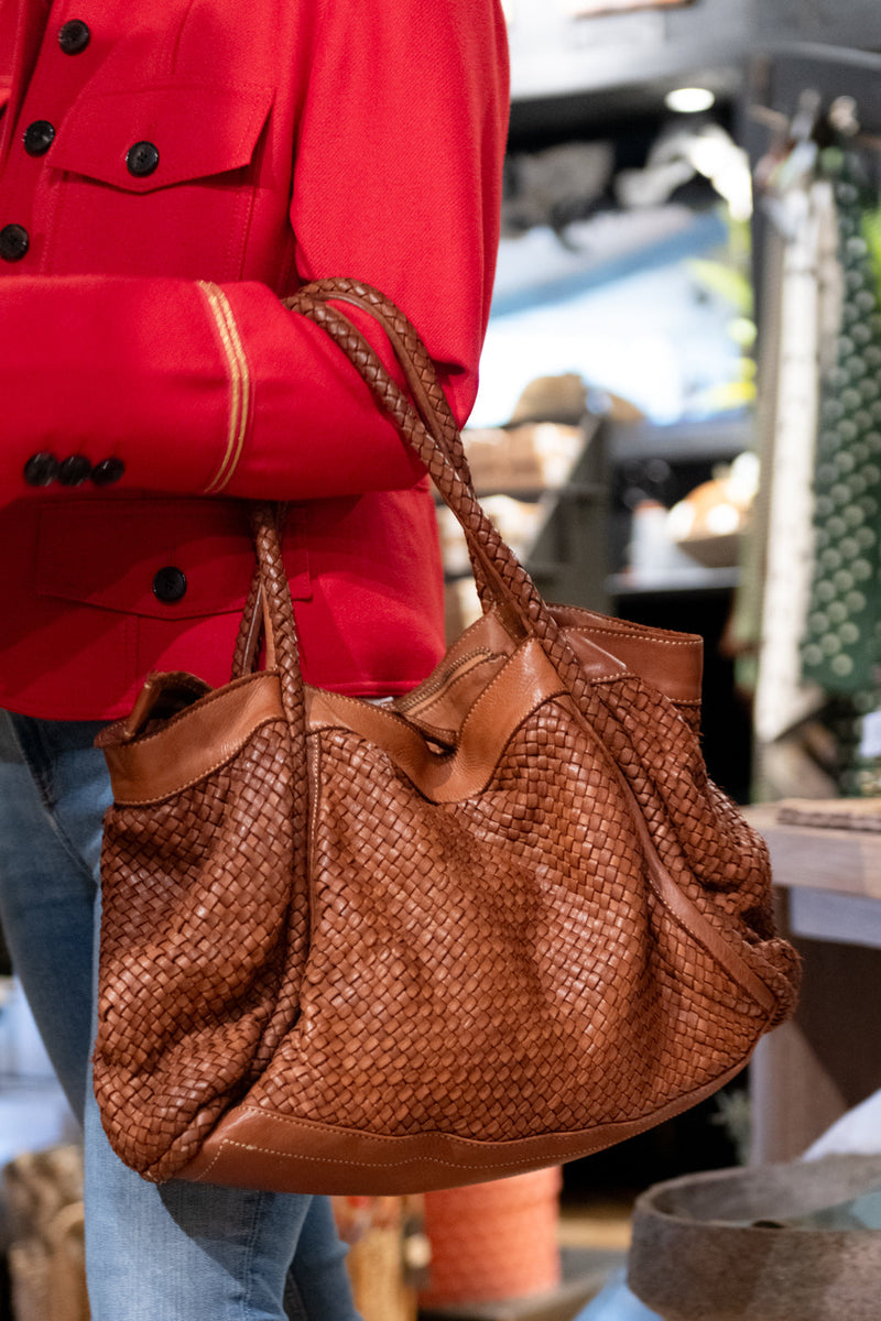 Premium Italian brand bag in woven leather