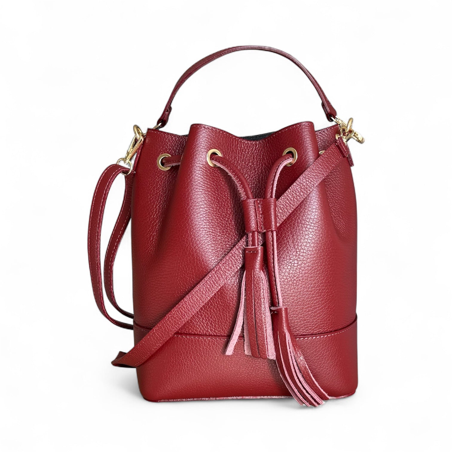 Italian leather bucket handbag 
Colour Wine 
Removable shoulder strap
Imported from Florence Italy 
Sussex Kent Surrey Independent handbag retailer 