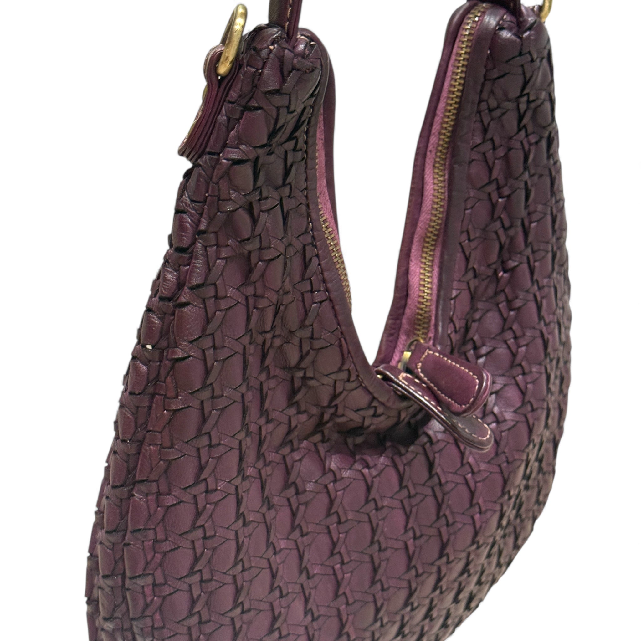 Hand woven Italian leather Burgundy handbag on a white background 