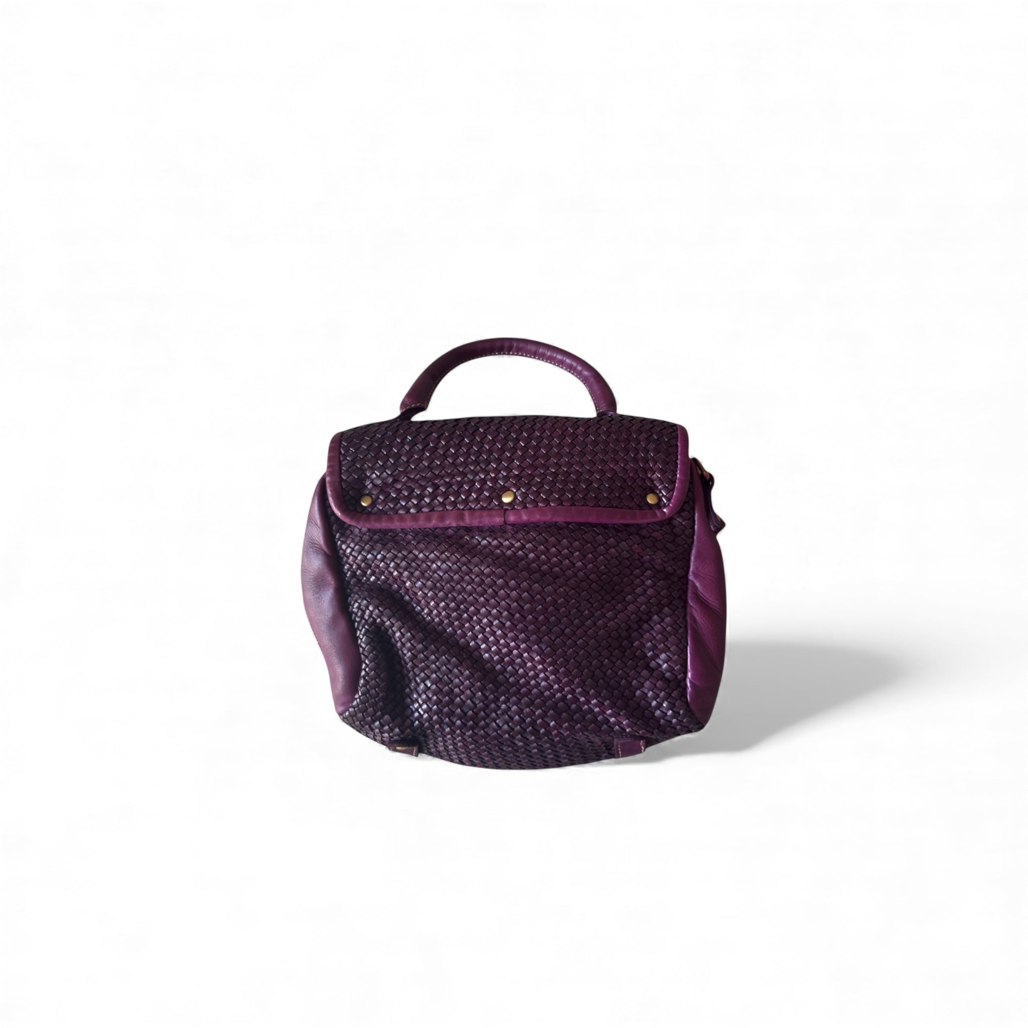 Showing the back of a hand woven Italian leather handbag on a white background, Sussex Kent Surrey independent handbag retailer