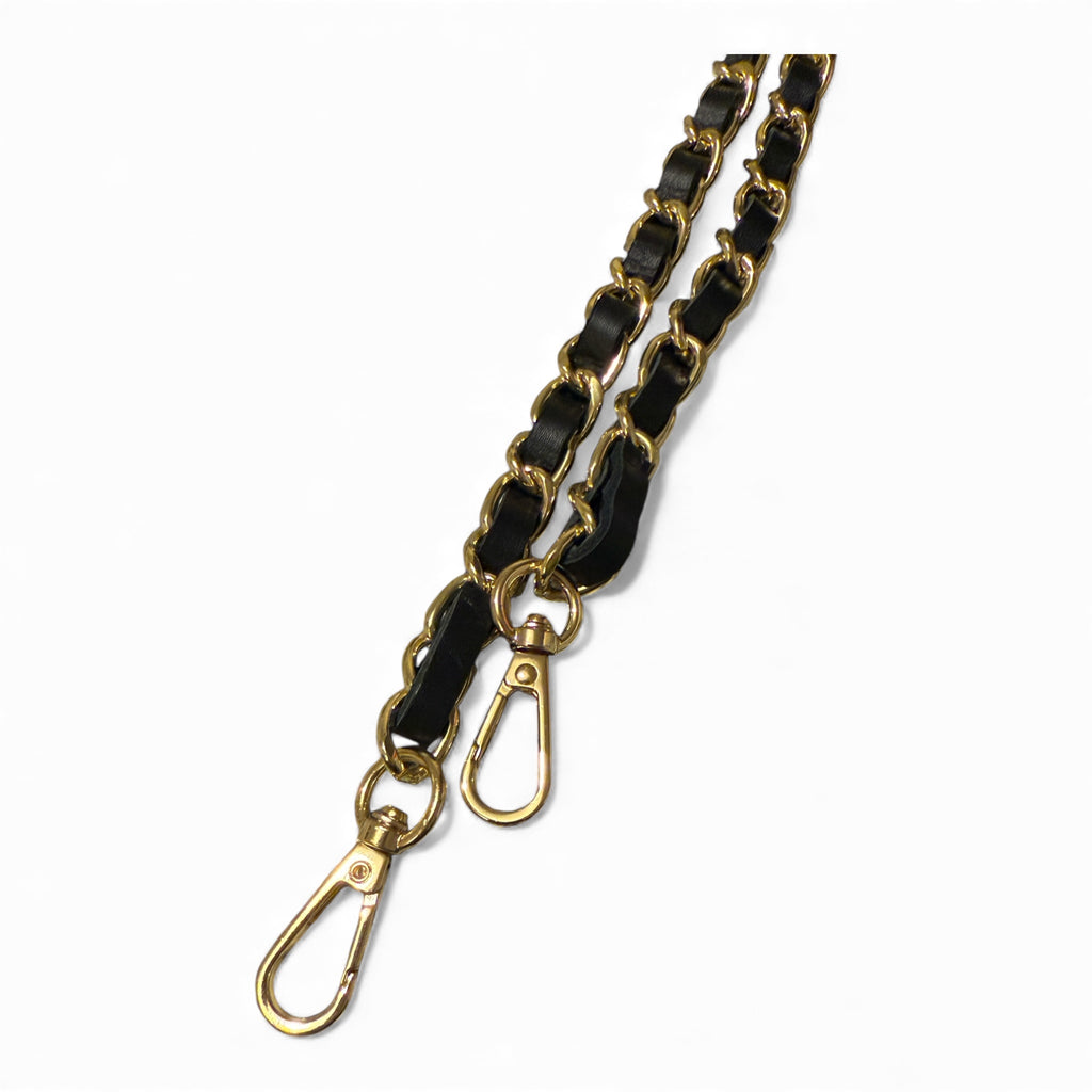 Close up image of leather shoulder straps Black and Gold 