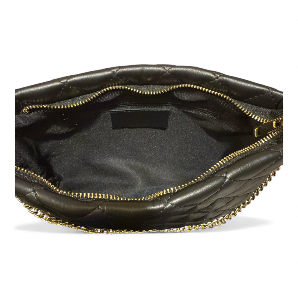 Close up inside a black Italian leather handbag on a white background 