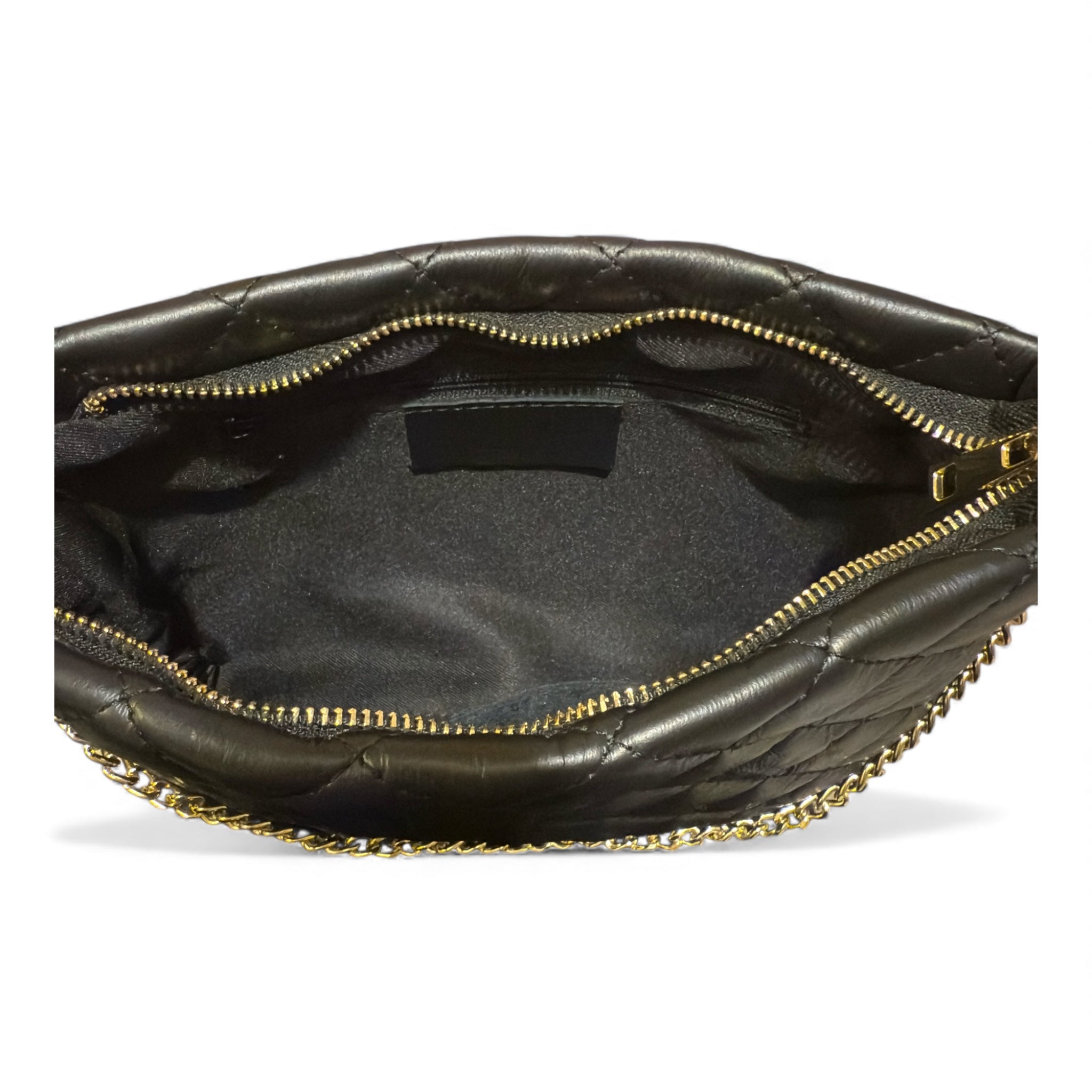 Close up inside a black Italian leather handbag on a white background 