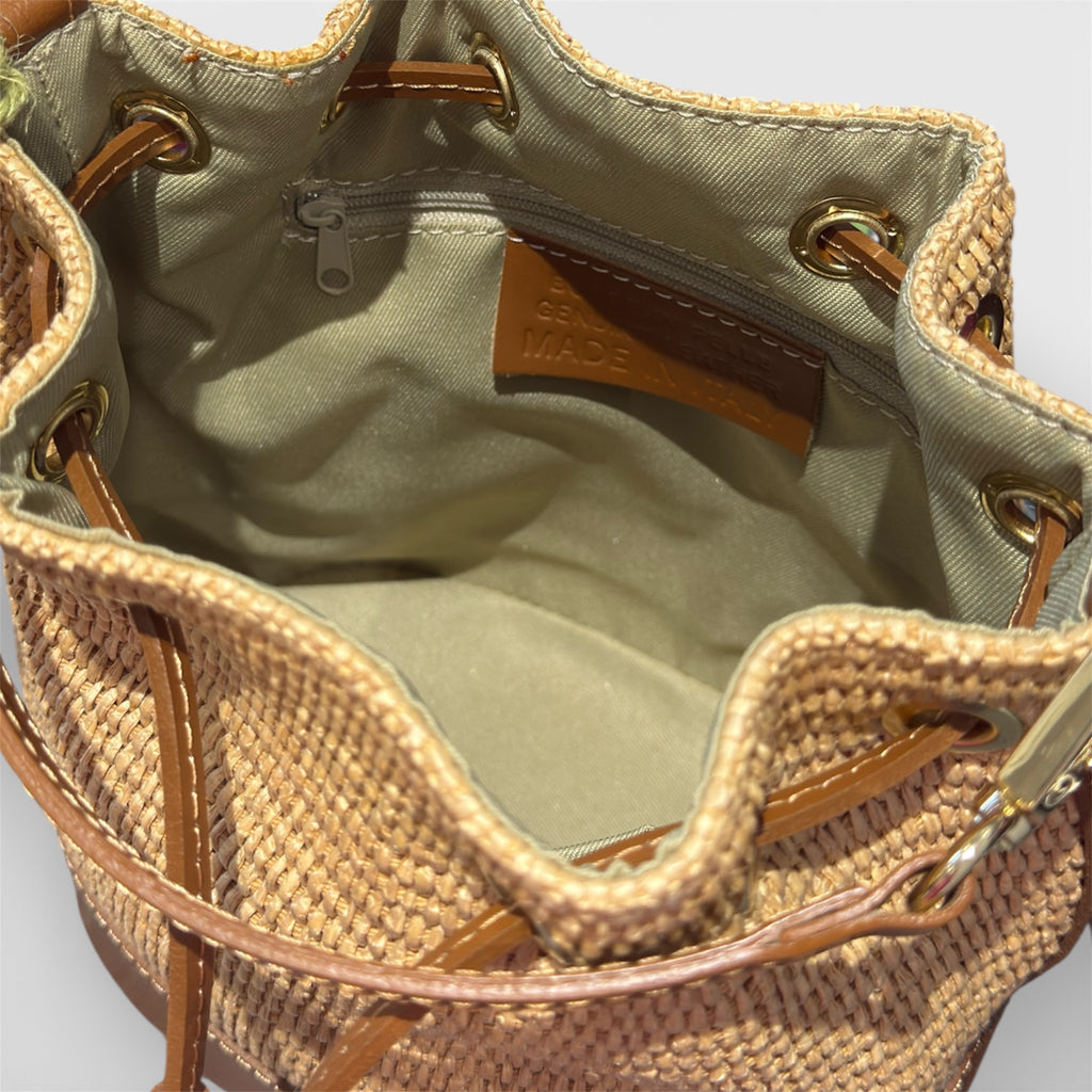 Tan raffia leather shoulder bucket bag with gold chain details 