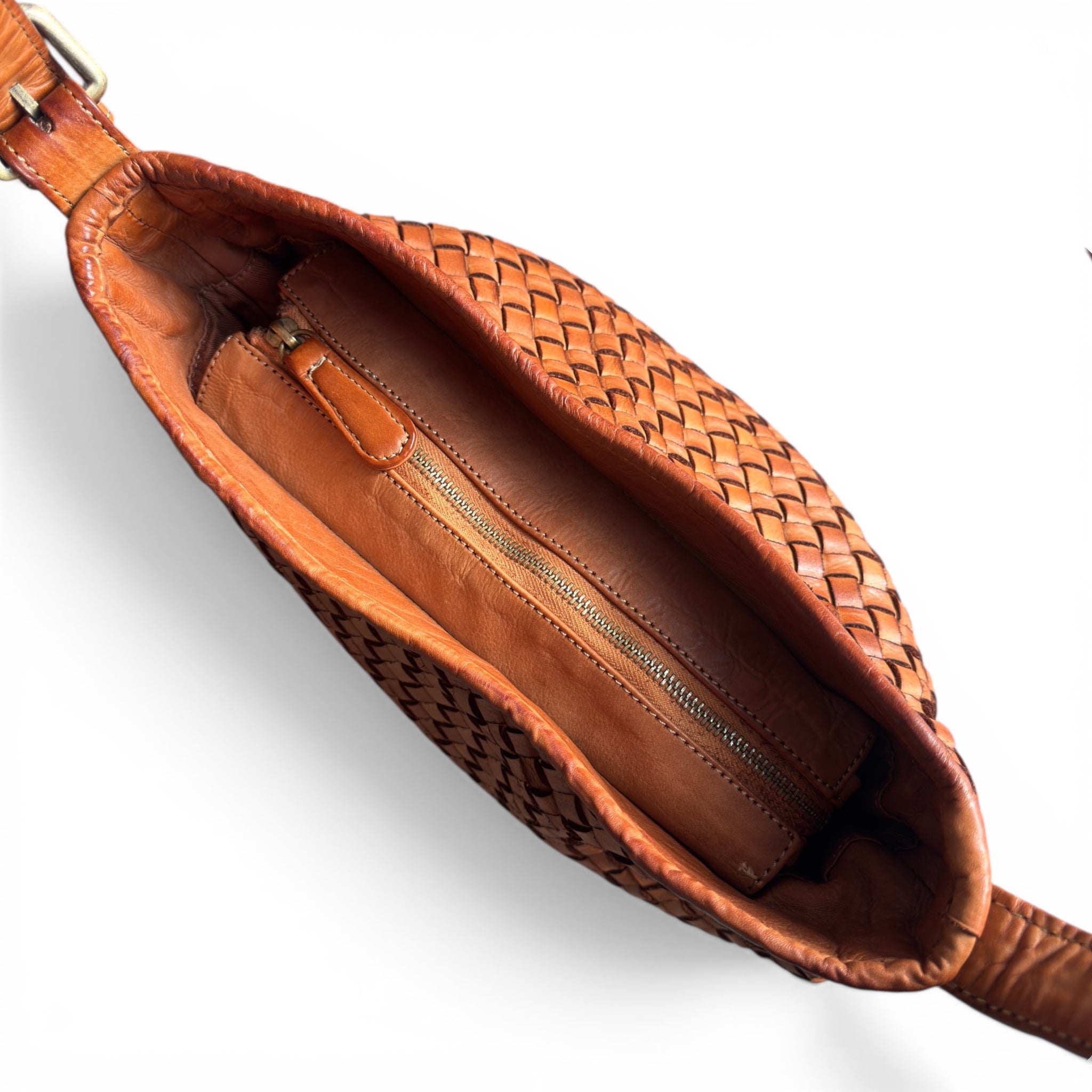 Showing top zip main closure tan leather handbag Italian woven leather handbag in warm tan leather