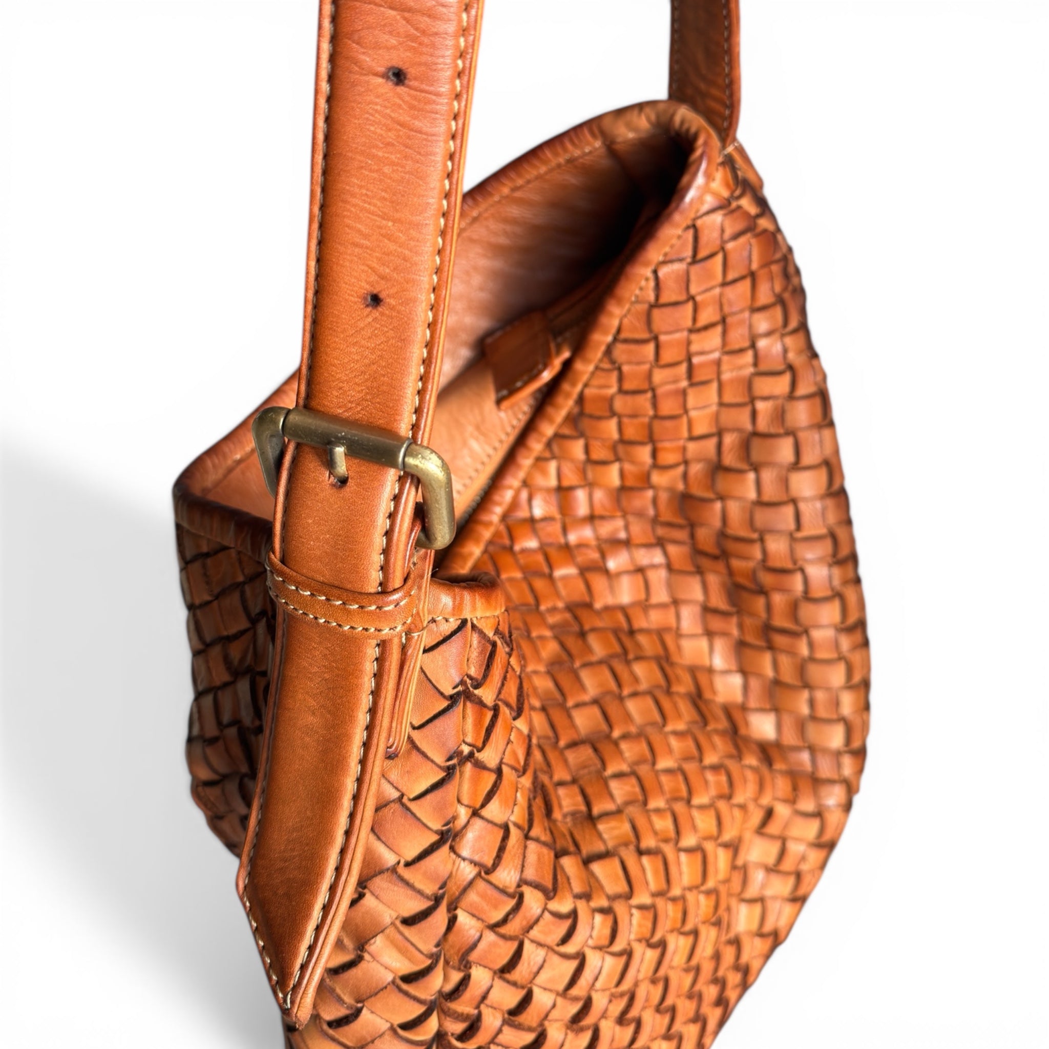 Tan hand woven Italian leather handbag on a white background. Made in Italy . UK independent retailer. 