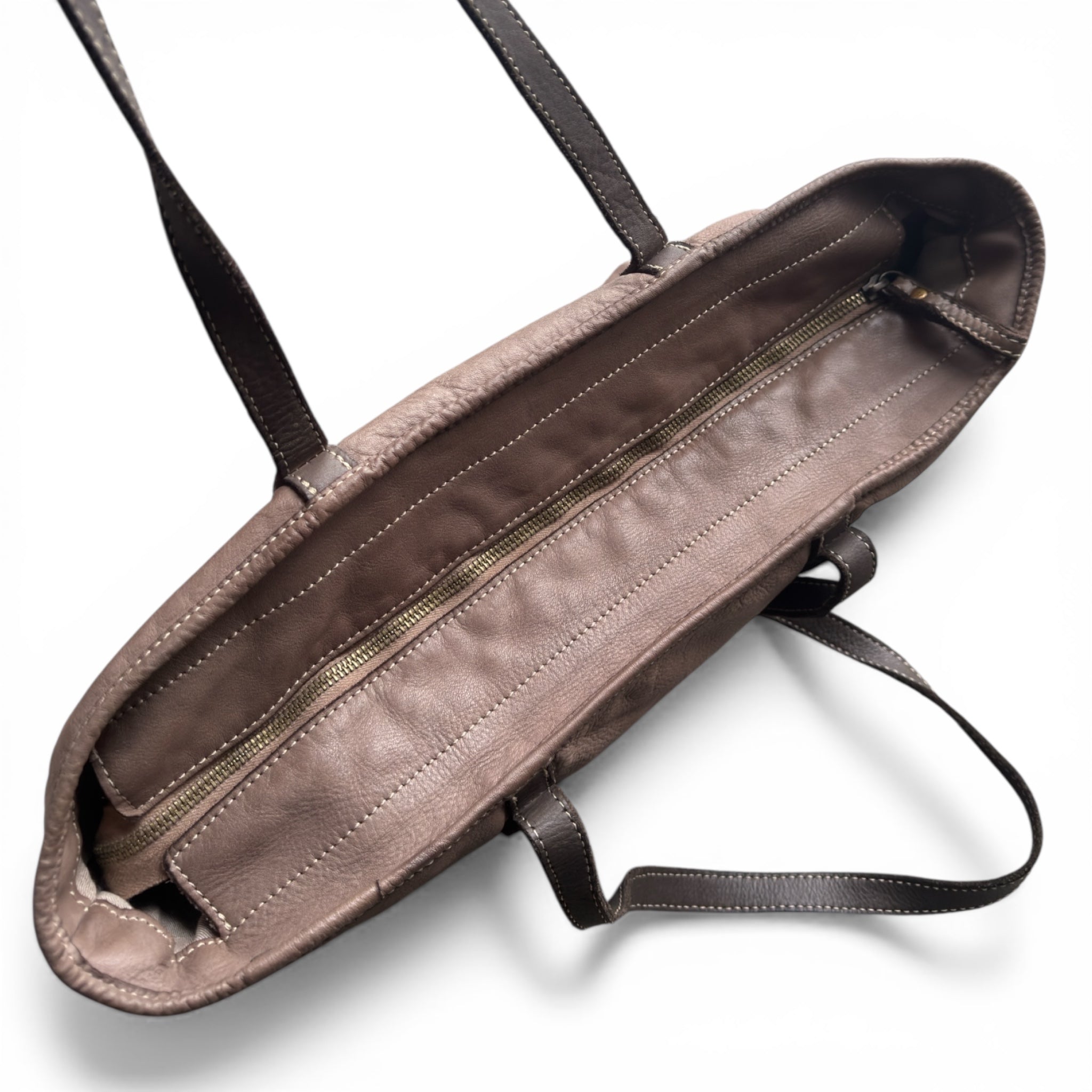 Taupe Italian  leather toe bag with a main secure zipper on a white background