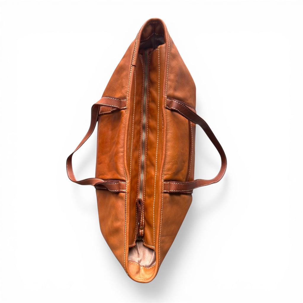 Tan calf Italian leather tote made in Italy showing main zip closure 