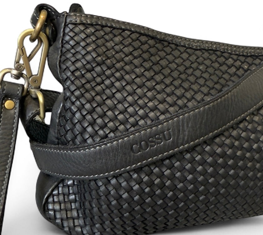 Black handwoven Italian leather handbag with visible Cossu name on a white background
Removable leather shoulder wrist strap made in Italy 